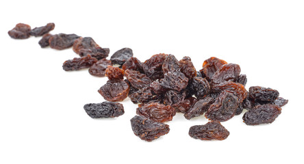 Dried raisins on a white background