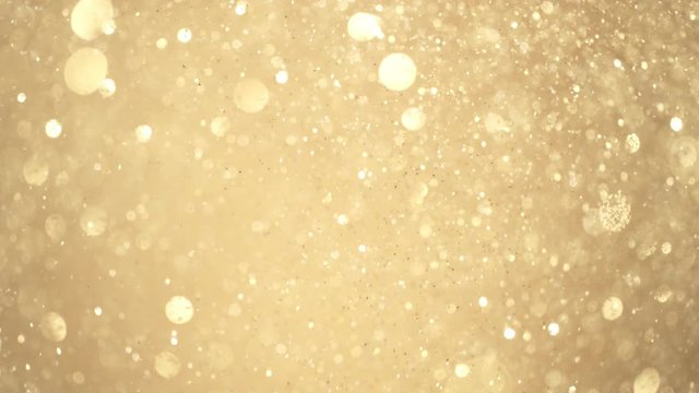 Golden Glitter Background in Super Slow Motion at 1000fps.