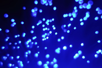 New Year and Christmas color illumination. The illusion of a salute explosion. The quirks of light fiber optic lamp.