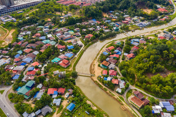 Aerial drone image of beautiful rural town of Menggatal Town, Sabah, Malaysia