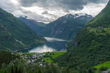 Naklejka na ściany i meble Beautiful view overlooking the Geiranger fjords in Norway.