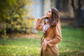 stylish woman in autumn park