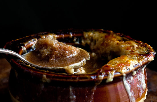 French onion soup with gruyere and croutons served in bowl