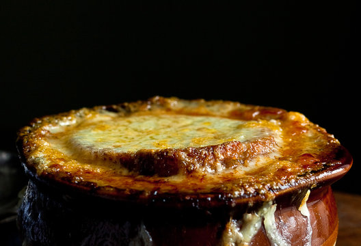 French onion soup with gruyere and croutons served in bowl