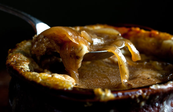 French onion soup with gruyere and croutons served in bowl