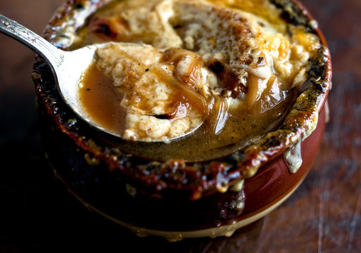 French onion soup with gruyere and croutons served in bowl