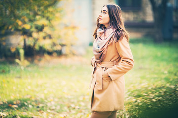 stylish woman in autumn park