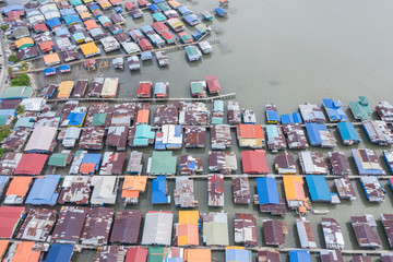 An aerial image of local water village houses at Kg. Sim Sim water village Sandakan City, Sabah, Malaysia. Sandakan once known as Little Hong Kong of Borneo.