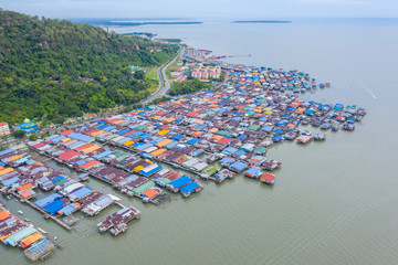 An aerial image of local water village houses at Kg. Sim Sim water village Sandakan City, Sabah,...
