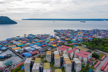 An aerial image of local water village houses at Kg. Sim Sim water village Sandakan City, Sabah,...