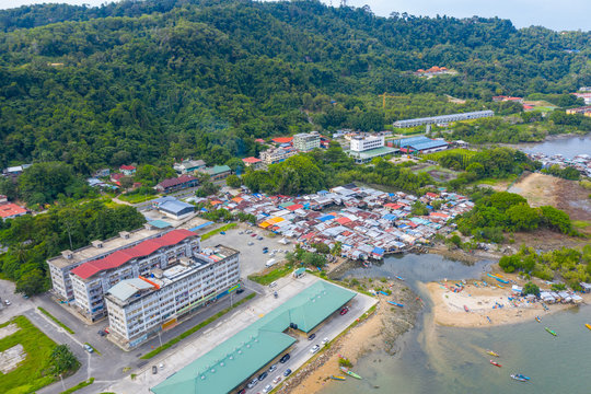 An aerial image of local water village houses at Kg. Sim Sim water village Sandakan City, Sabah, Malaysia. Sandakan once known as Little Hong Kong of Borneo.