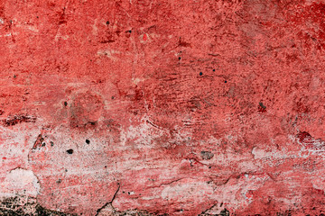 Texture of a concrete wall with cracks and scratches which can be used as a background