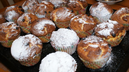 Kitchen. Table. Cupcakes on a platter and a platter.