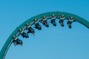 People enjoying loop in amazing rollercoaster 10.