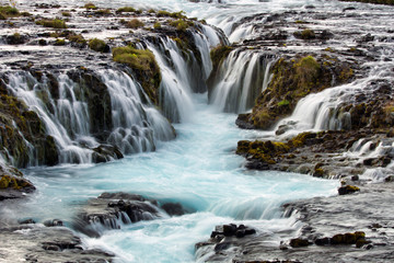 Waterfall cascade in Bruarfoss/Iceland. Closeup, travel and photography concept.