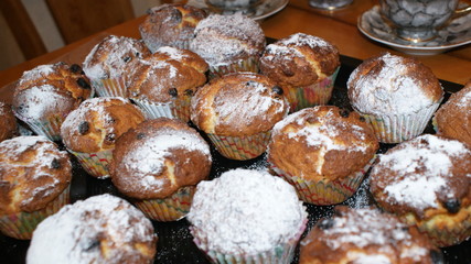 Kitchen. Table. Cupcakes on a platter and a platter.