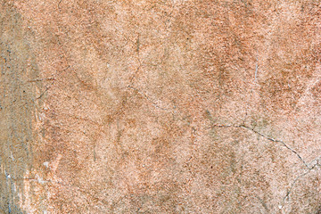 Texture of a concrete wall with cracks and scratches which can be used as a background