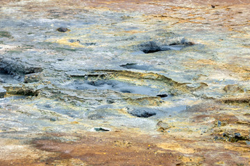 Bubbling hot water from the ground in geothermal area in Iceland. Power, hot, powerful, sulfur, texture concept.