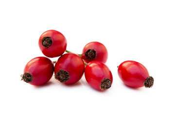 Ripe rose hip isolated on white background
