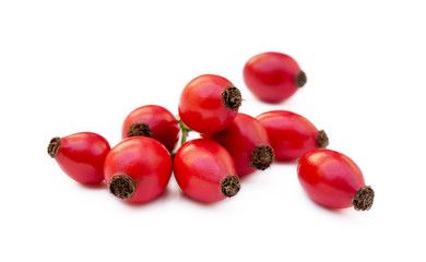 Ripe rose hip isolated on white background