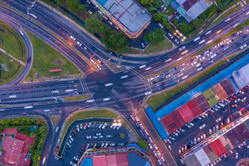 Fototapeta na wymiar Aerial Drone image of car moving on surrounding Residential area at Kota Kinabalu, Sabah, Malaysia