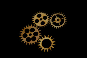 Gear mechanism on black background close up