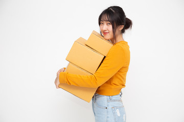 Happy Asian woman holding package parcel box, Delivery courier and shipment service concept