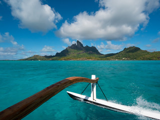 Sailing around blue lagoon and Otemanu mountain at Bora Bora island, Tahiti, French Polynesia