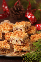 Fototapeta na wymiar Pie bars with berry jam, spices and crumble