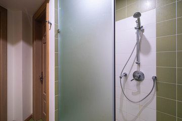 Fototapeta na wymiar Shower in modern interior of bathroom.