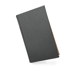 Closed color hardcover book on white background