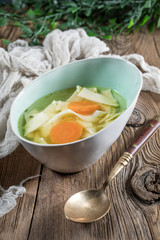 Broth - chicken soup in a bowl.