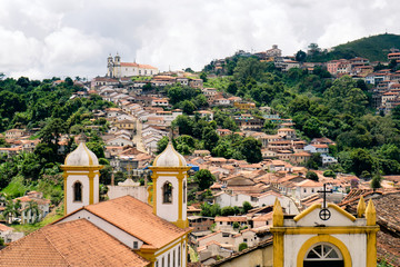 View over the rooftops and churches of the old gold mining town of Ouro Preto in Brazil