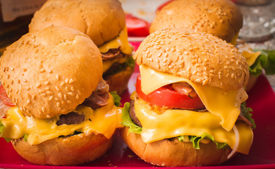 delicious juicy burgers are on the table