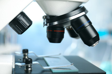 Closeup view of modern microscope in laboratory. Medical equipment