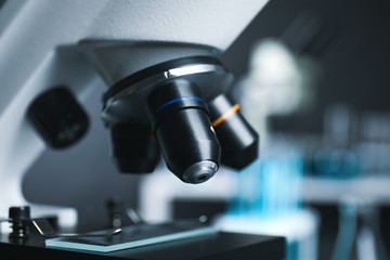 Closeup view of modern microscope in laboratory. Medical equipment