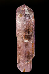 macro mineral amethyst stone on a black background