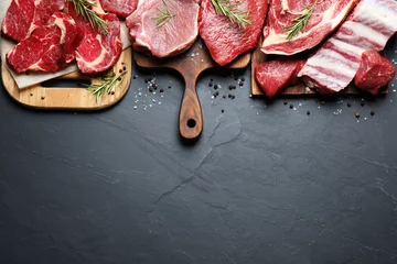 Fotobehang Flat lay composition with fresh meat on grey table. Space for text © New Africa