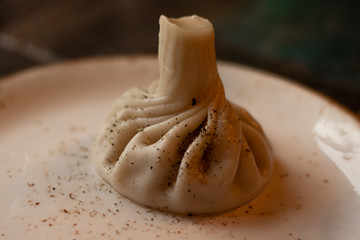 One khinkali from a georgian restaurant