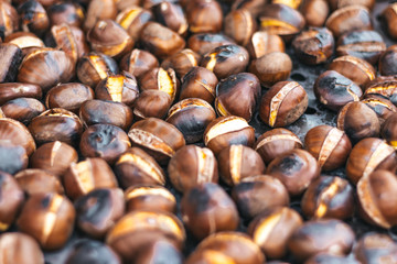 Fried  chestnuts on the metal plate
