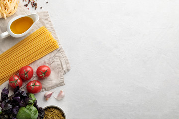 Fototapeta na wymiar Flat lay italian food on white background. Copy space and top view