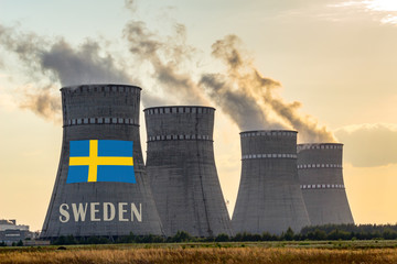 Nuclear plant chimneys displaying flag of Sweden with according text. Energy pollution accidents in...