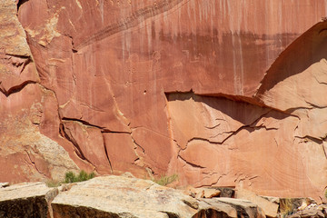 Obraz na płótnie Canvas Ancient Fremont People petroglyphs make present day visitor aware of their existence oin the sandstone walls of Capitol Reef National Park, Utan
