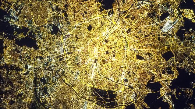 Aerial Paris France at night rotating animation city at night satellite view. Contains public domain image by Nasa