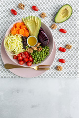 Raw vegan salad with assorted vegetables