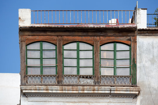 Three Windows and a Balcony