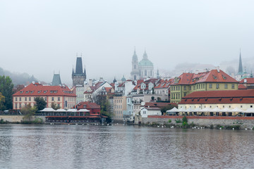 Fototapeta premium The detail of the entrance to Devil Stream, a tiny canal from vltava river into the center of Lesser Quarter of Prague, historical settlement of capitol of Czech Republic.