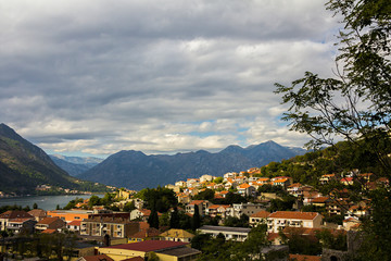 The view from the Fort (St John Fortress) in the mountains slope of Kotor town and Kotor bay with yachts, Montenegro 