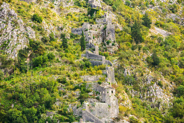 Ancient walls of Kotor Fort (St John Fortress) in the mountains slope of Kotor, Montenegro 