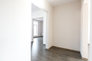 unfurnished house or apartment in bright colors with a dark floor